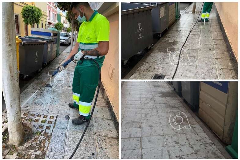 Limpieza de la acera por un empleado de la concesionaria de Limpieza (Foto TA)